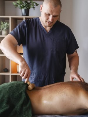 side-view-man-getting-professional-massage (2)